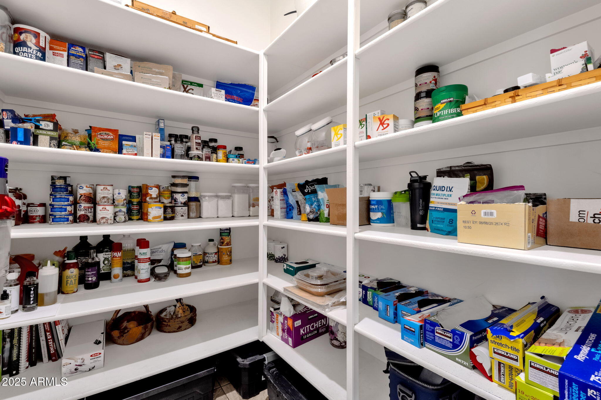 22322 East Rosa Road Queen Creek, AZ 85142 - Photo 14 of 83 a room with a refrigerator and a shelf