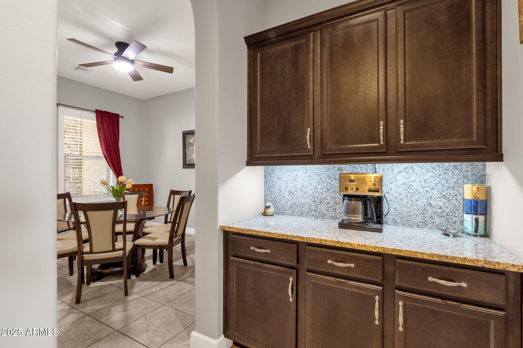 22322 East Rosa Road Queen Creek, AZ 85142 - Photo 16 of 83 a kitchen with stainless steel appliances granite countertop a sink and cabinets