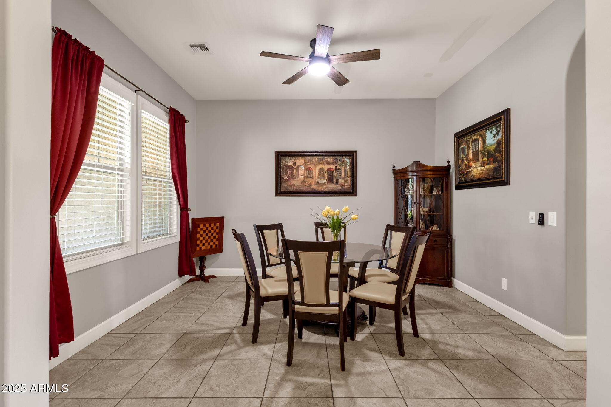 22322 East Rosa Road Queen Creek, AZ 85142 - Photo 20 of 83 a view of a dining room with furniture and a large window