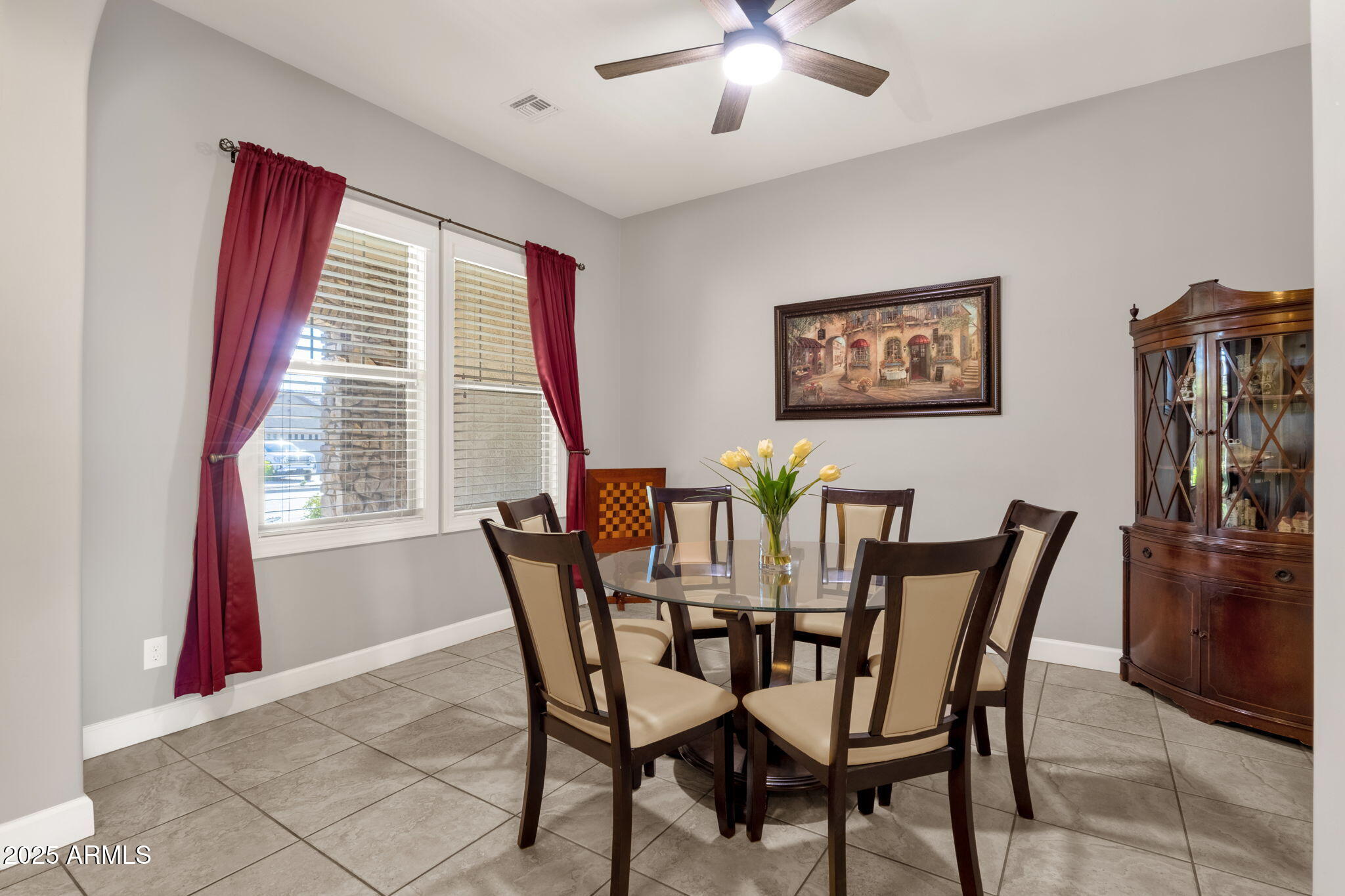22322 East Rosa Road Queen Creek, AZ 85142 - Photo 21 of 83 a view of a dining room with furniture and a chandelier
