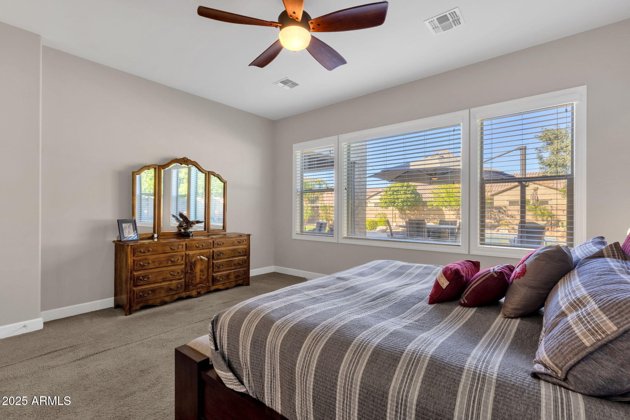 22322 East Rosa Road Queen Creek, AZ 85142 - Photo 28 of 83 a bedroom with a bed dresser and a window