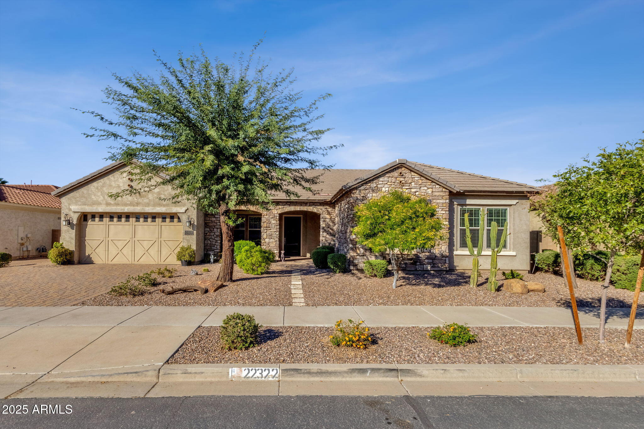 22322 East Rosa Road Queen Creek, AZ 85142 - Photo 2 of 83 a front view of a house with porch