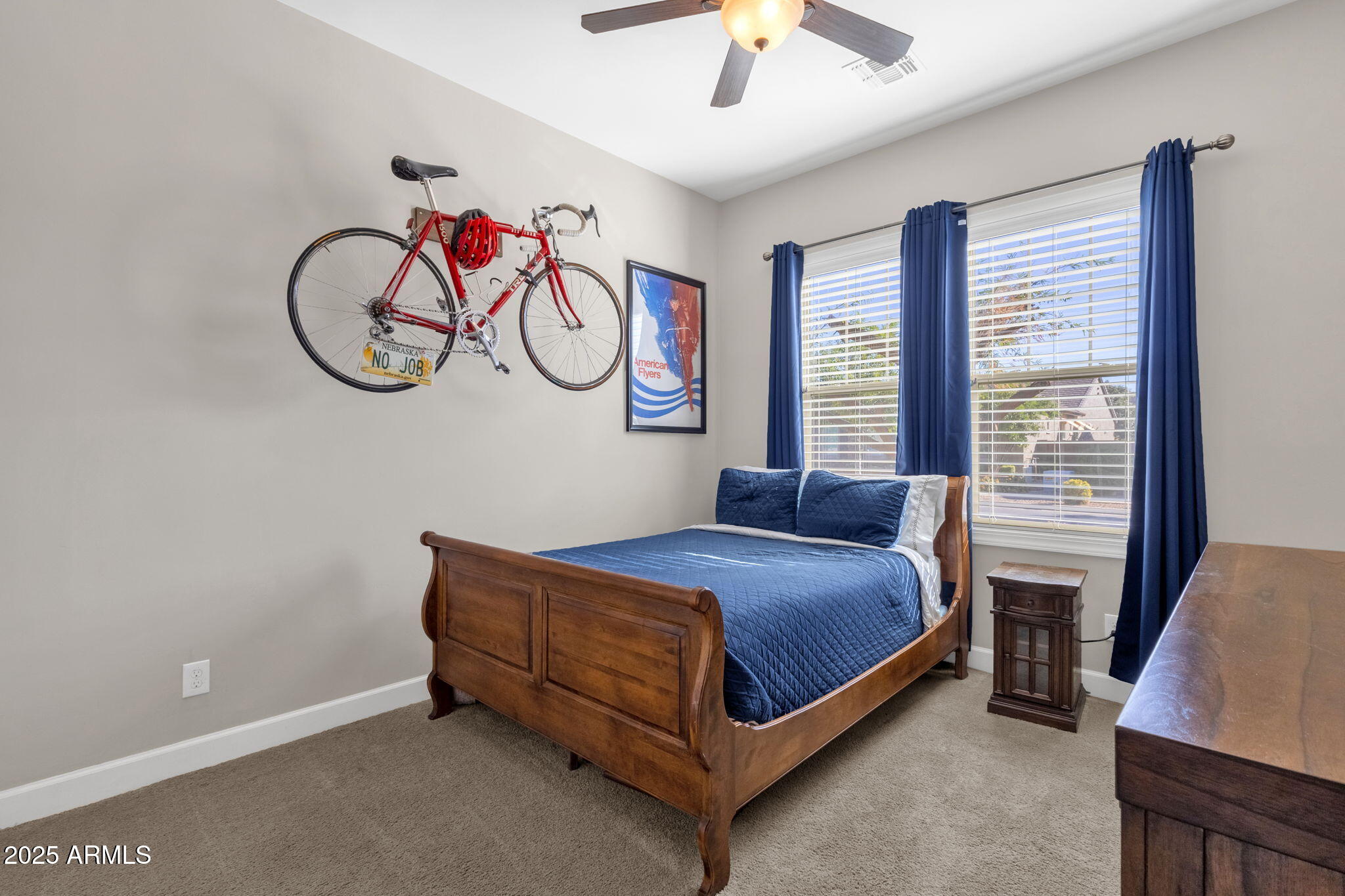 22322 East Rosa Road Queen Creek, AZ 85142 - Photo 39 of 83 a bed sitting in a bedroom next to a window