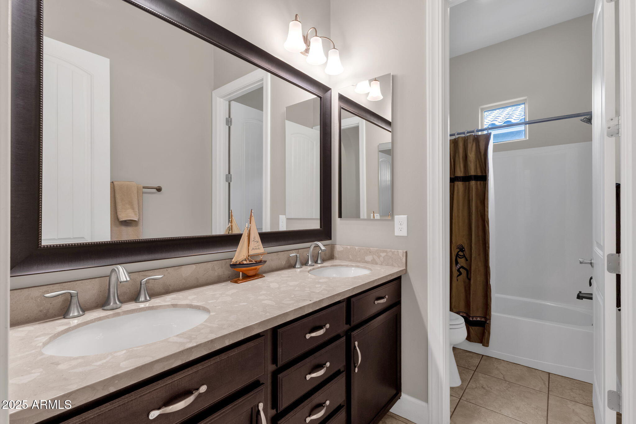 22322 East Rosa Road Queen Creek, AZ 85142 - Photo 40 of 83 a bathroom with a granite countertop sink and a mirror