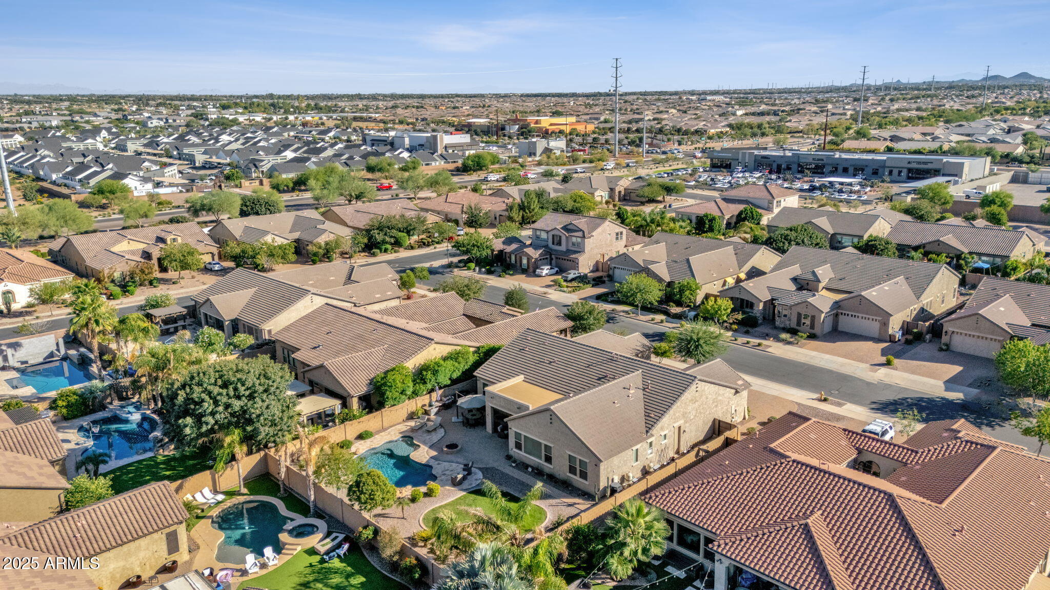 22322 East Rosa Road Queen Creek, AZ 85142 - Photo 5 of 83 an aerial view of a city with lots of residential buildings