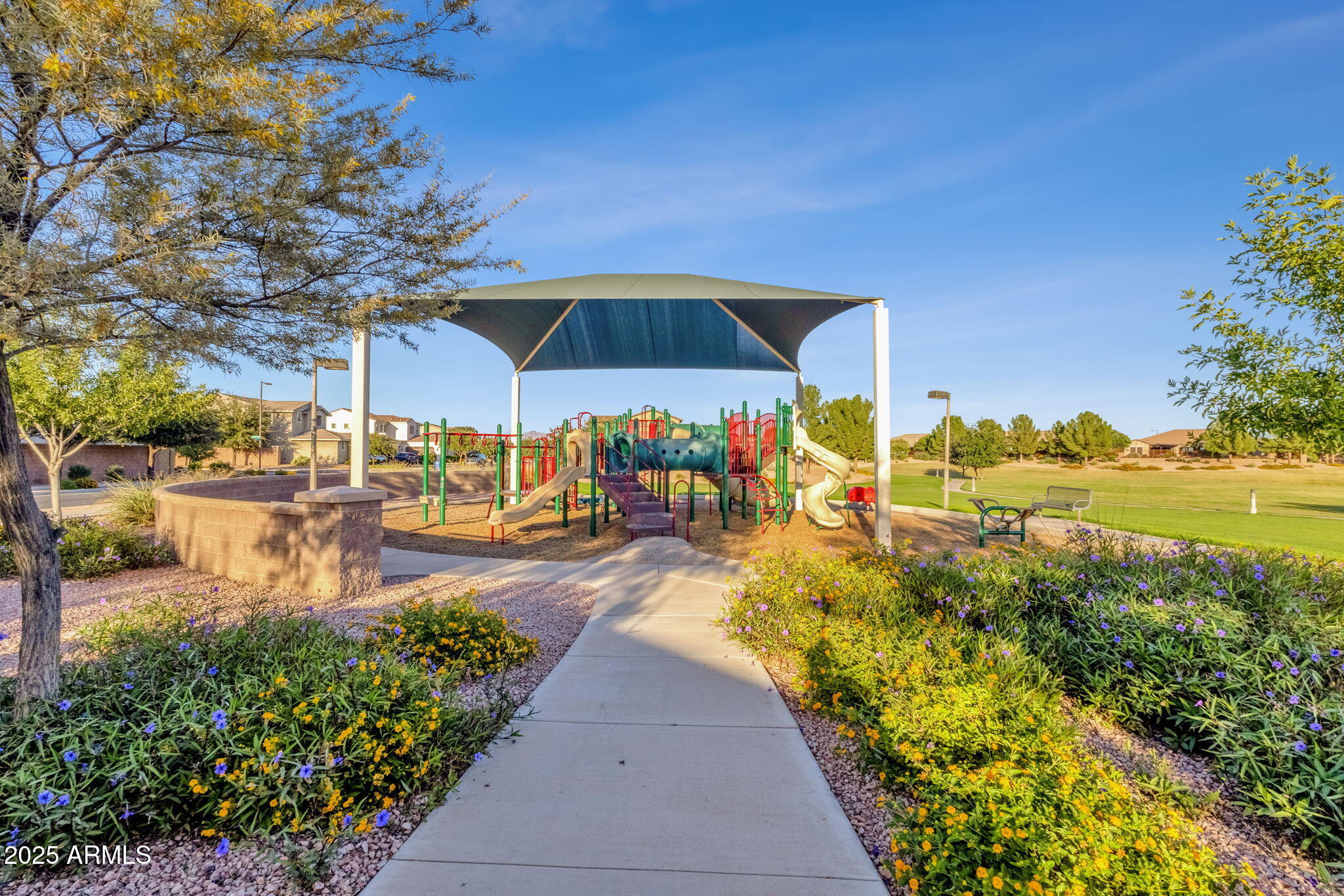 22322 East Rosa Road Queen Creek, AZ 85142 - Photo 74 of 83 a view of a swimming pool with an outdoor seating