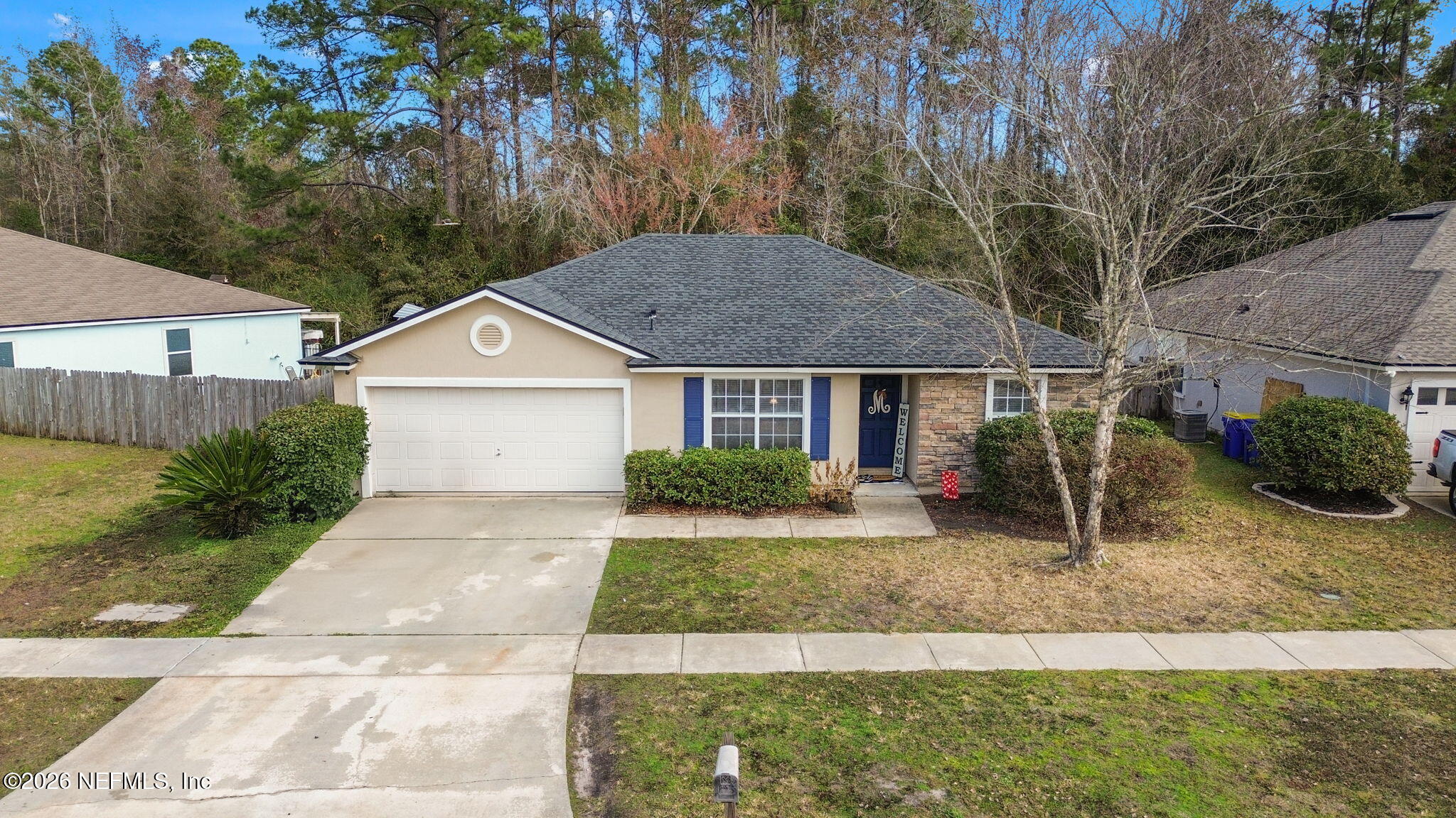 front view of a house with a yard
