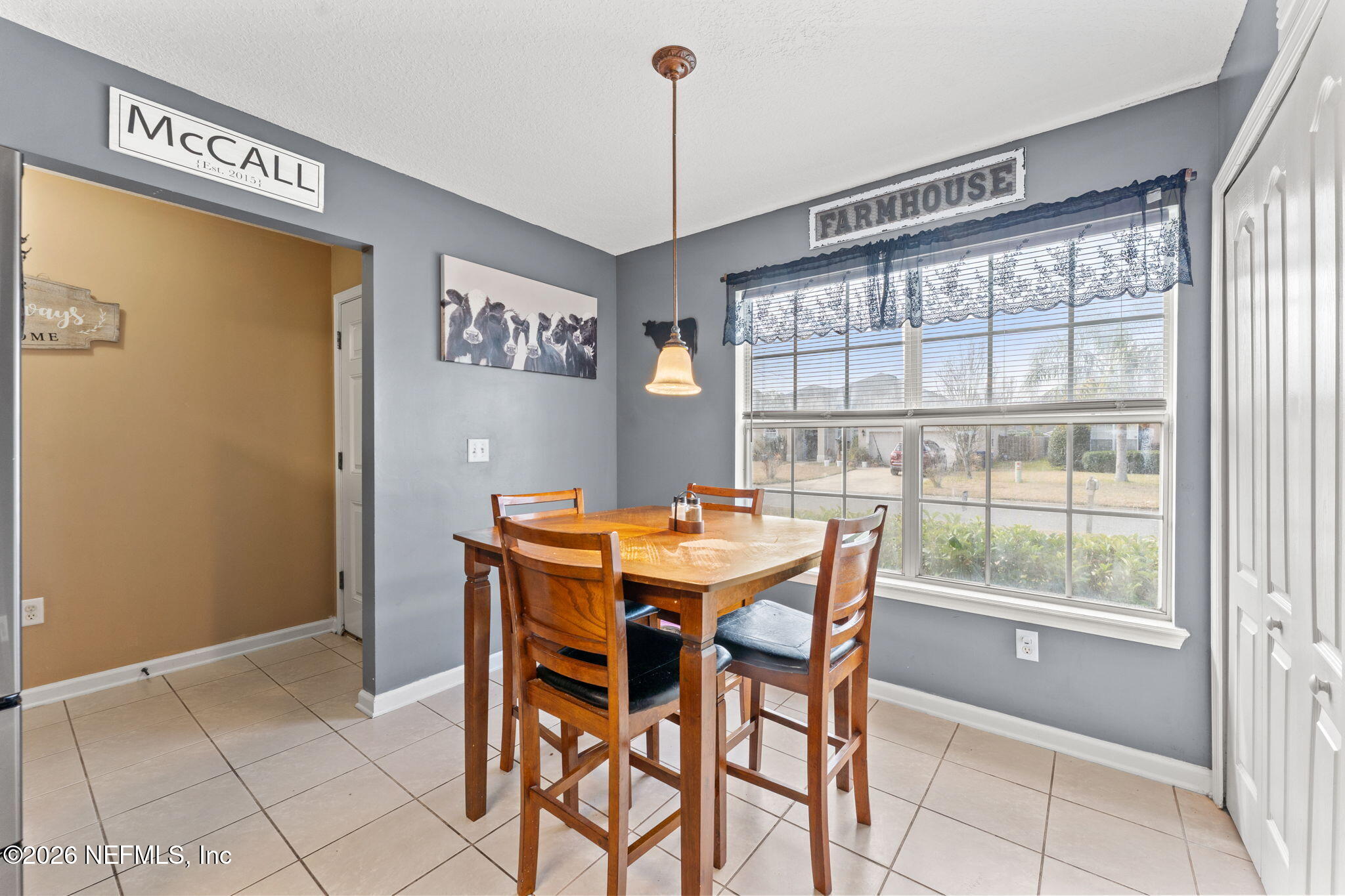 45212 Ingleham Circle Callahan, FL 32011 - Photo 11 of 35 a view of a dining room with furniture window and outside view