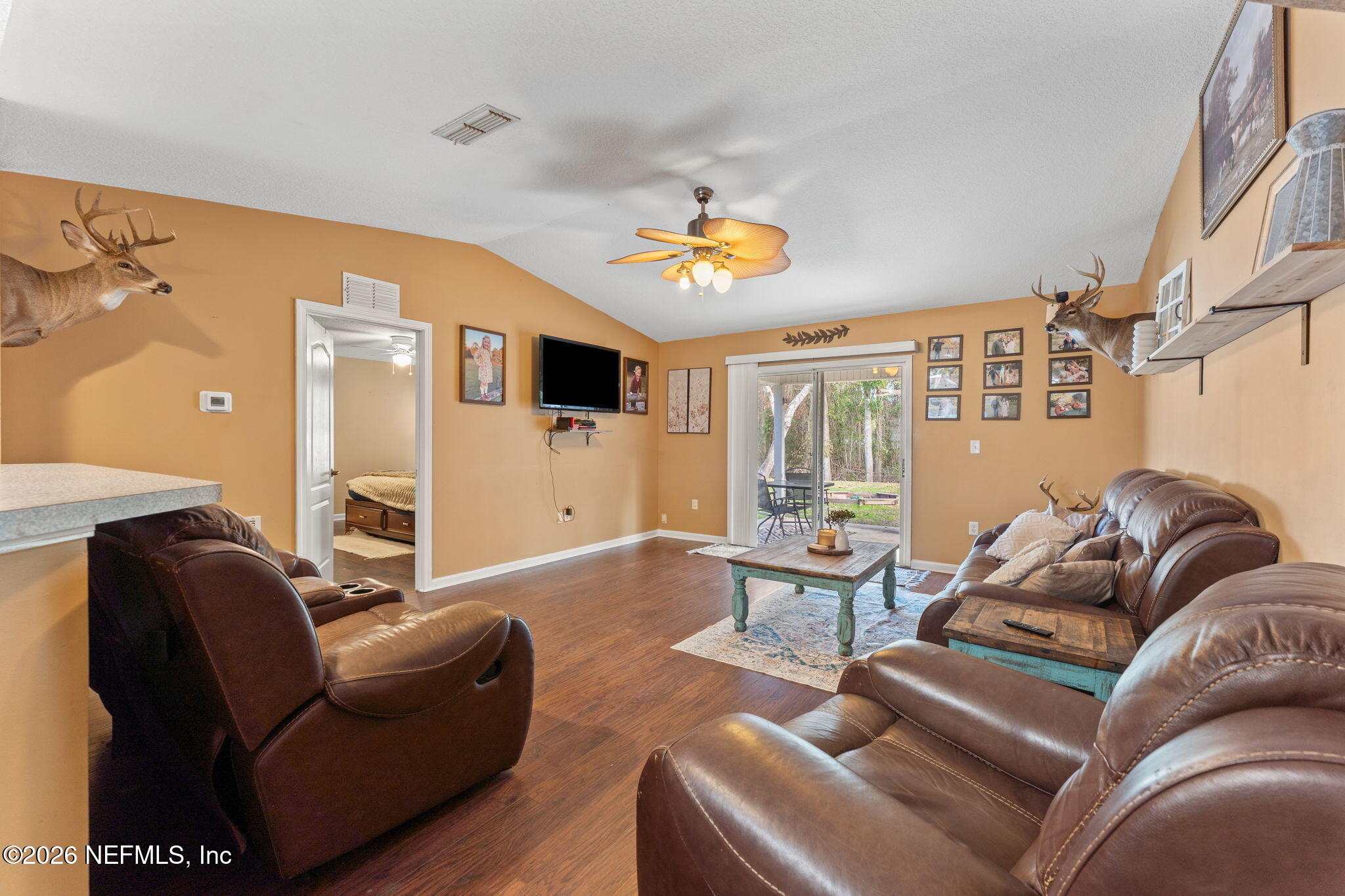 45212 Ingleham Circle Callahan, FL 32011 - Photo 12 of 35 a living room with furniture and a large window