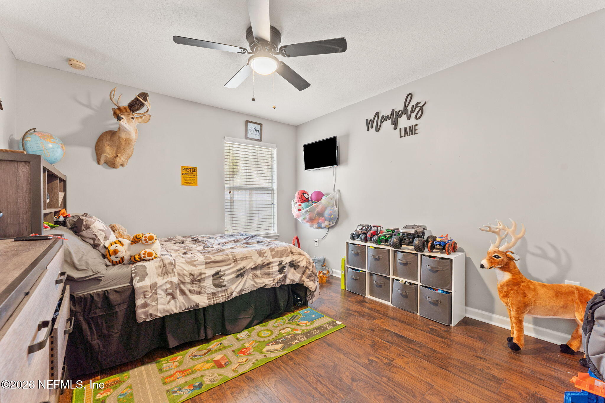 45212 Ingleham Circle Callahan, FL 32011 - Photo 14 of 35 a bedroom with a bed and a chair