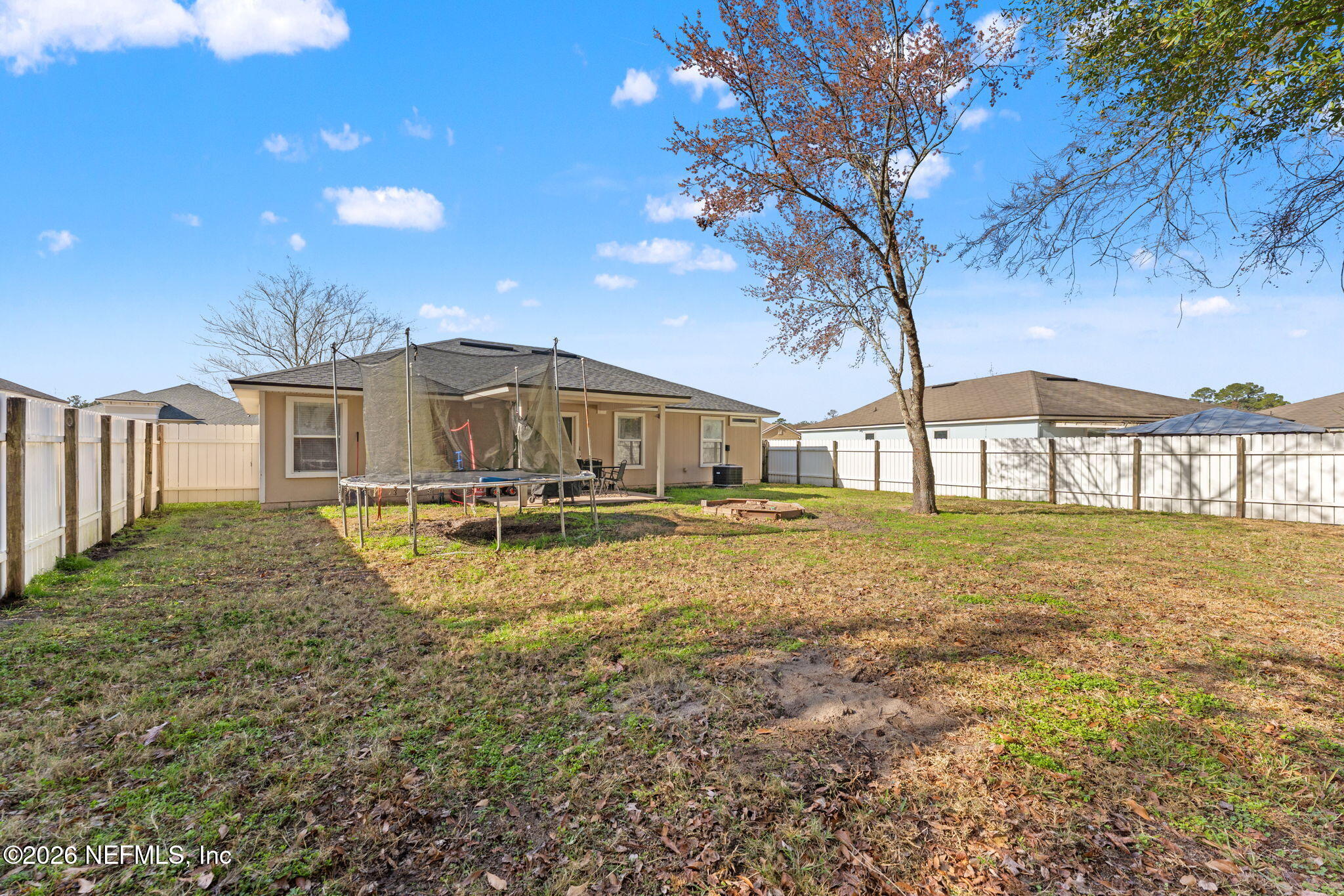 45212 Ingleham Circle Callahan, FL 32011 - Photo 20 of 35 a view of a house with a yard