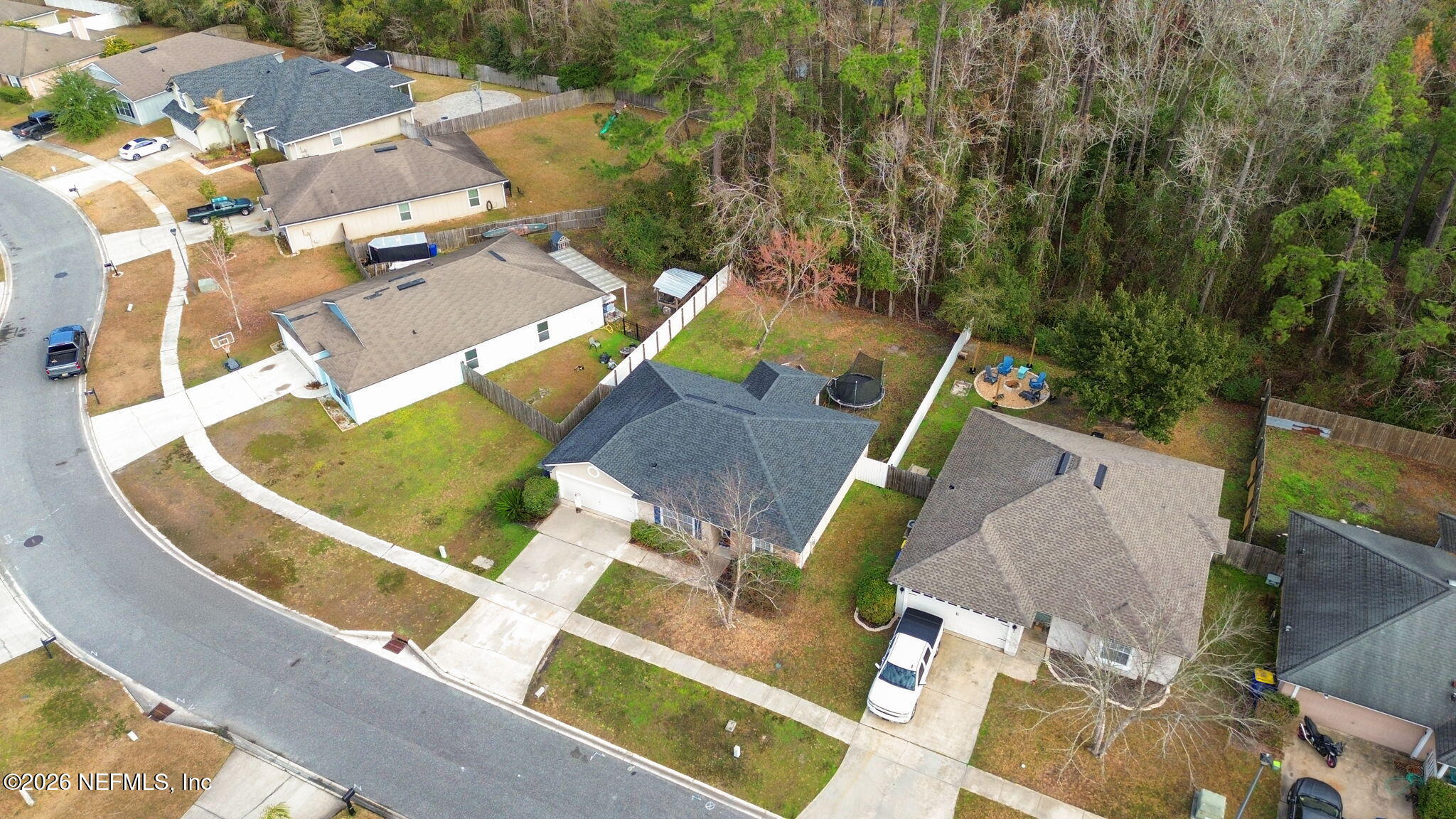 45212 Ingleham Circle Callahan, FL 32011 - Photo 22 of 35 an aerial view of residential house with outdoor space and swimming pool