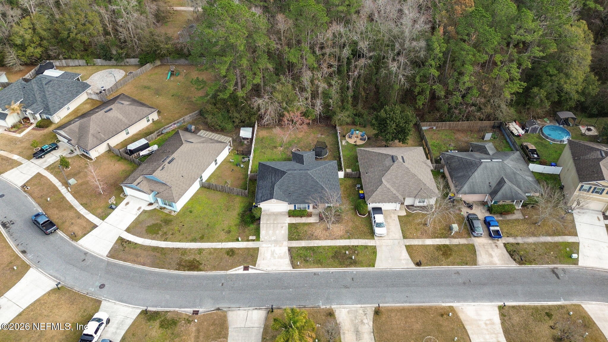 45212 Ingleham Circle Callahan, FL 32011 - Photo 26 of 35 an aerial view of residential houses with outdoor space