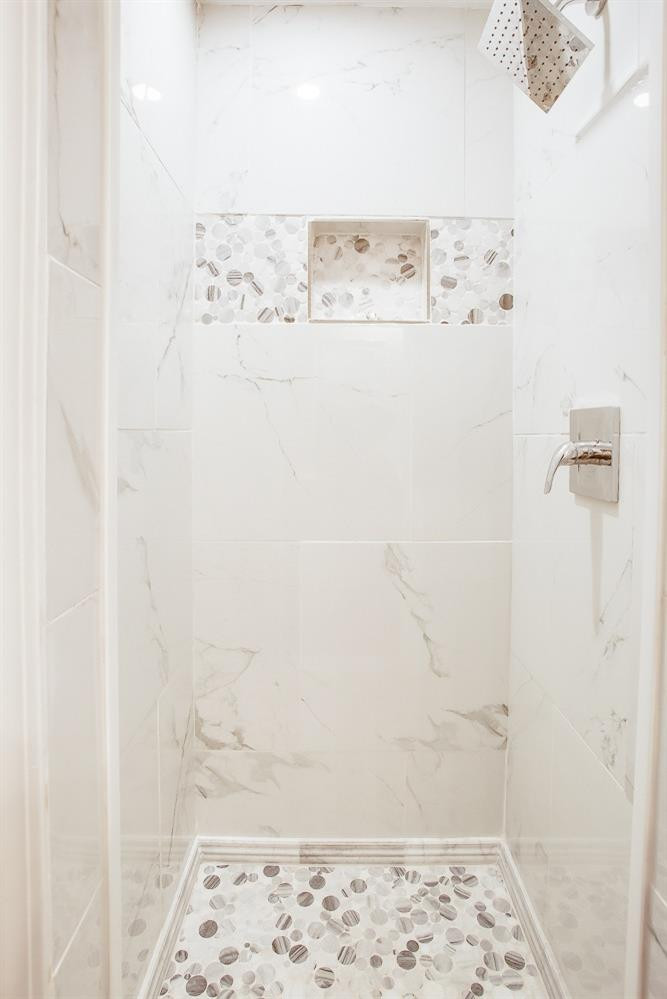 4509 40th Street Lubbock, TX 79414 - Photo 12 of 21 a bathroom with a shower