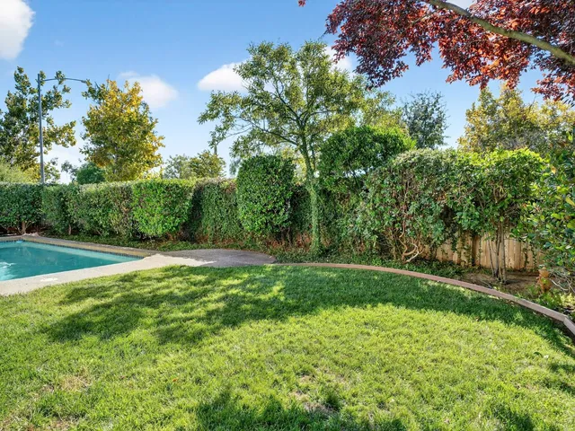a view of a balcony with chairs