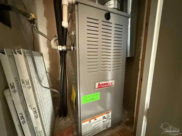 a bathroom with a shower and a window