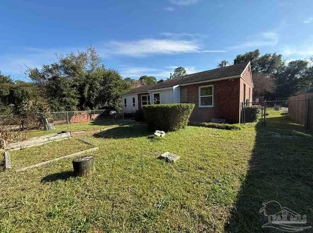 a house view with a garden space