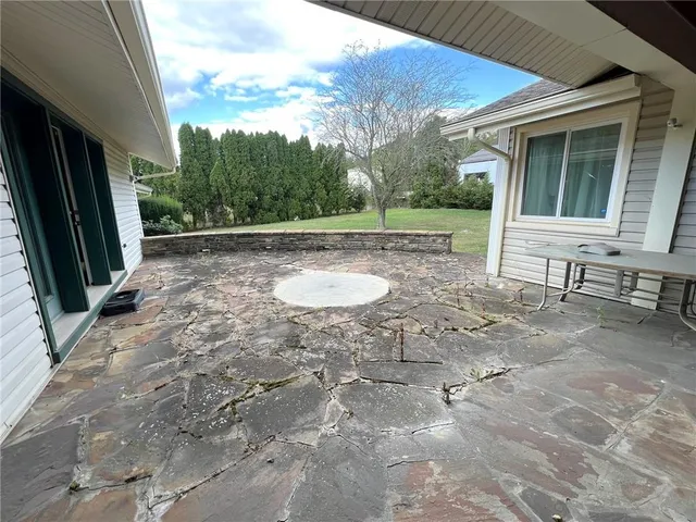 a view of backyard with outdoor space