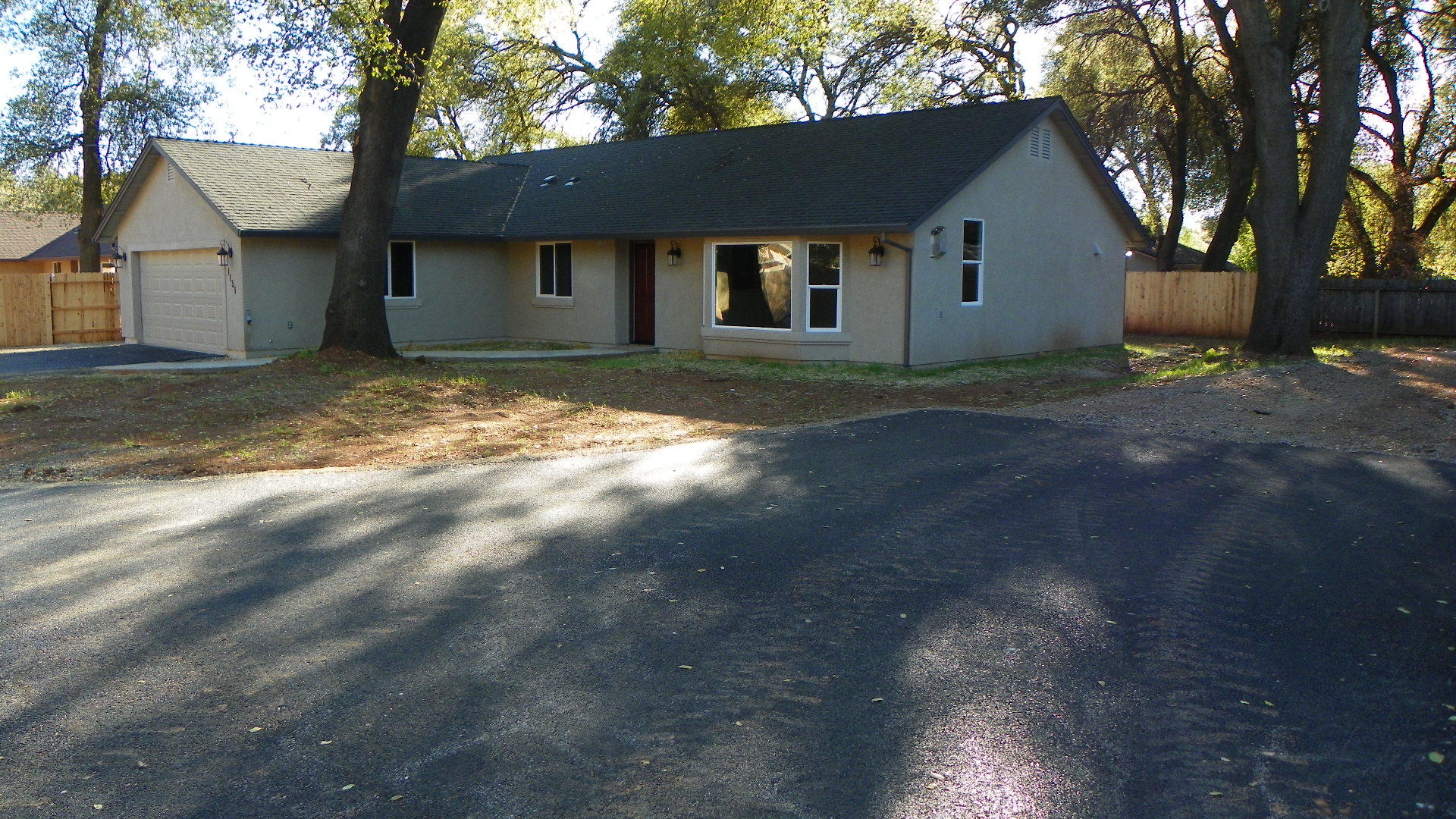 1151 Harpole Road Redding, CA 96002 - Photo 2 of 17 a view of a house with a yard