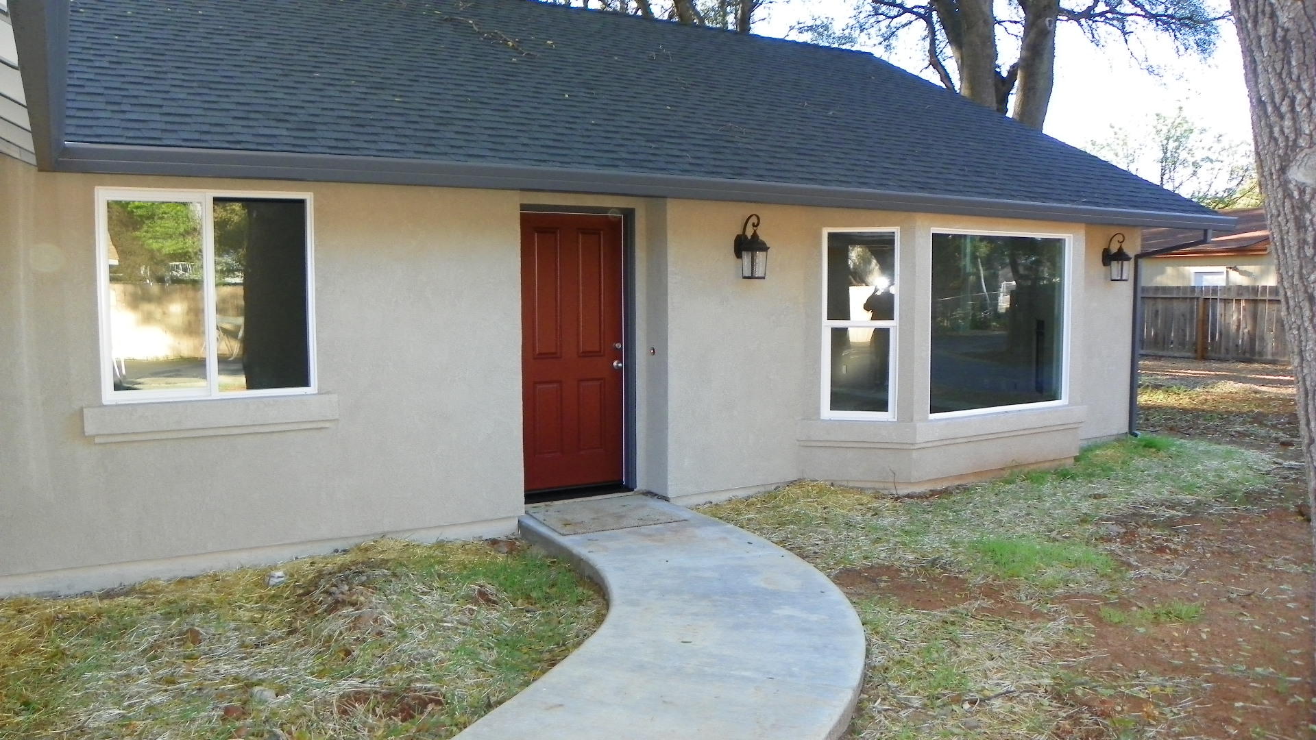 1151 Harpole Road Redding, CA 96002 - Photo 4 of 17 front view of a house with a yard