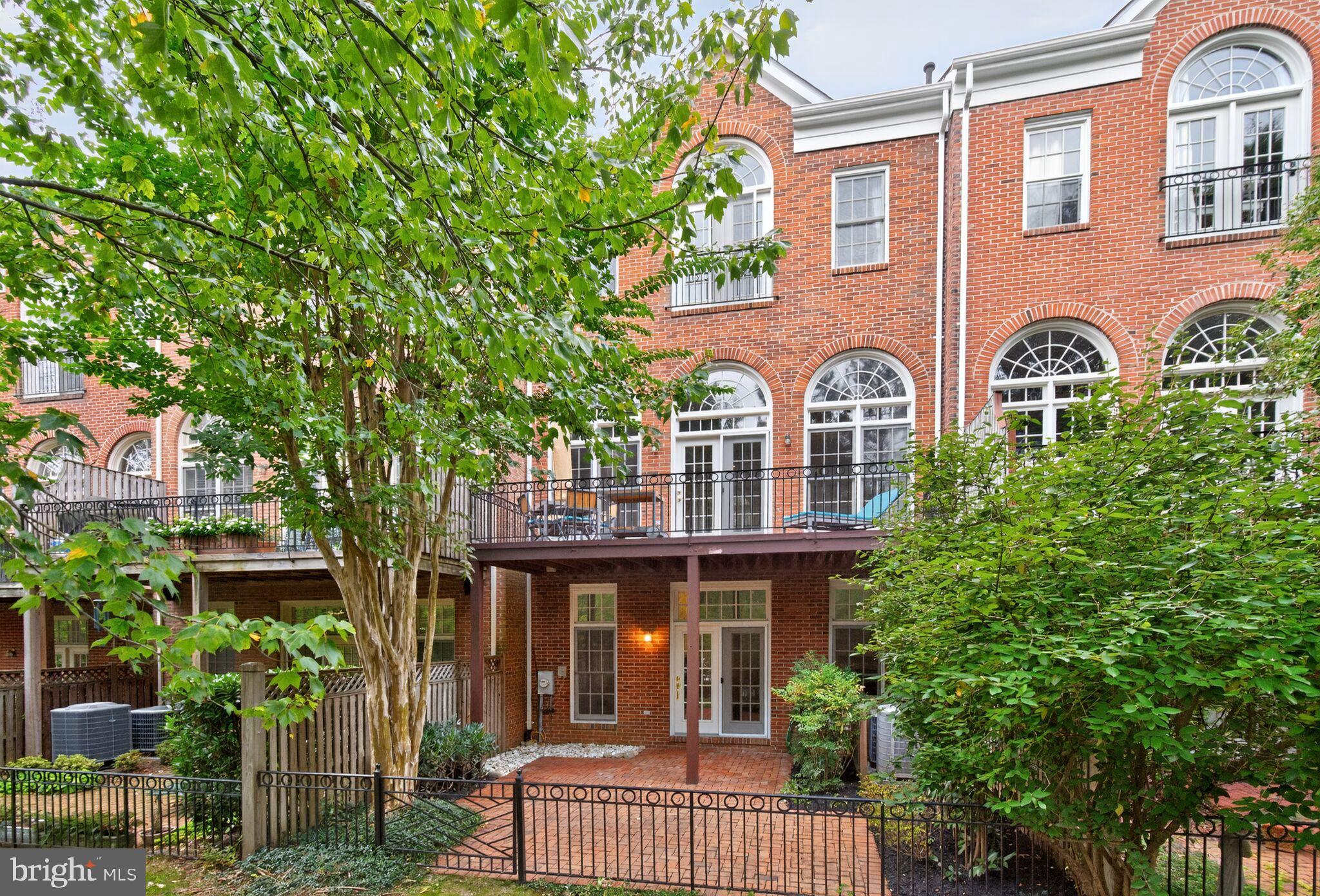 4015 Mansion Drive Northwest Washington, DC 20007 - Photo 28 of 34 a front view of a house with garden