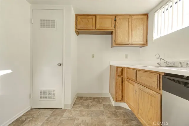 a view of a kitchen with sink