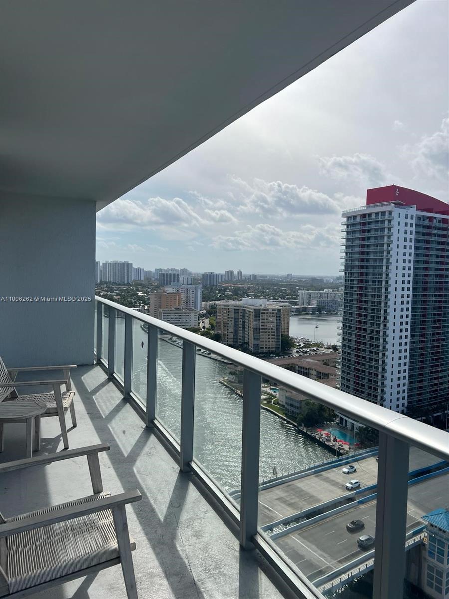 4010 South Ocean Drive, Unit R2004 Hollywood, FL 33019 - Photo 14 of 34 a view of balcony with furniture