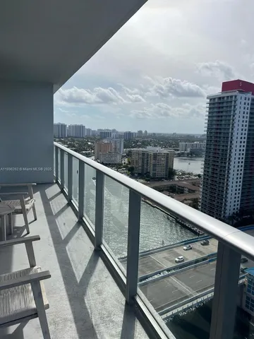 a balcony with view of city