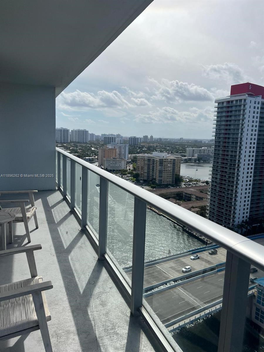 4010 South Ocean Drive, Unit R2004 Hollywood, FL 33019 - Photo 15 of 34 a balcony with view of city