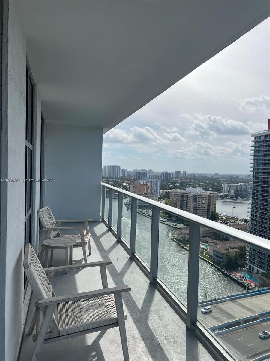 4010 South Ocean Drive, Unit R2004 Hollywood, FL 33019 - Photo 18 of 34 a view of balcony with furniture