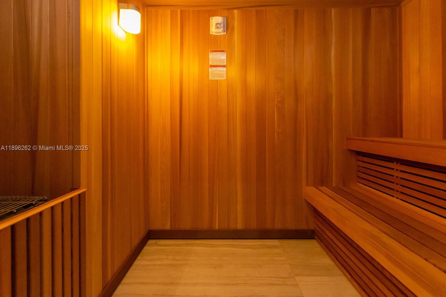 4010 South Ocean Drive, Unit R2004 Hollywood, FL 33019 - Photo 30 of 34 a view of a door with wooden walls