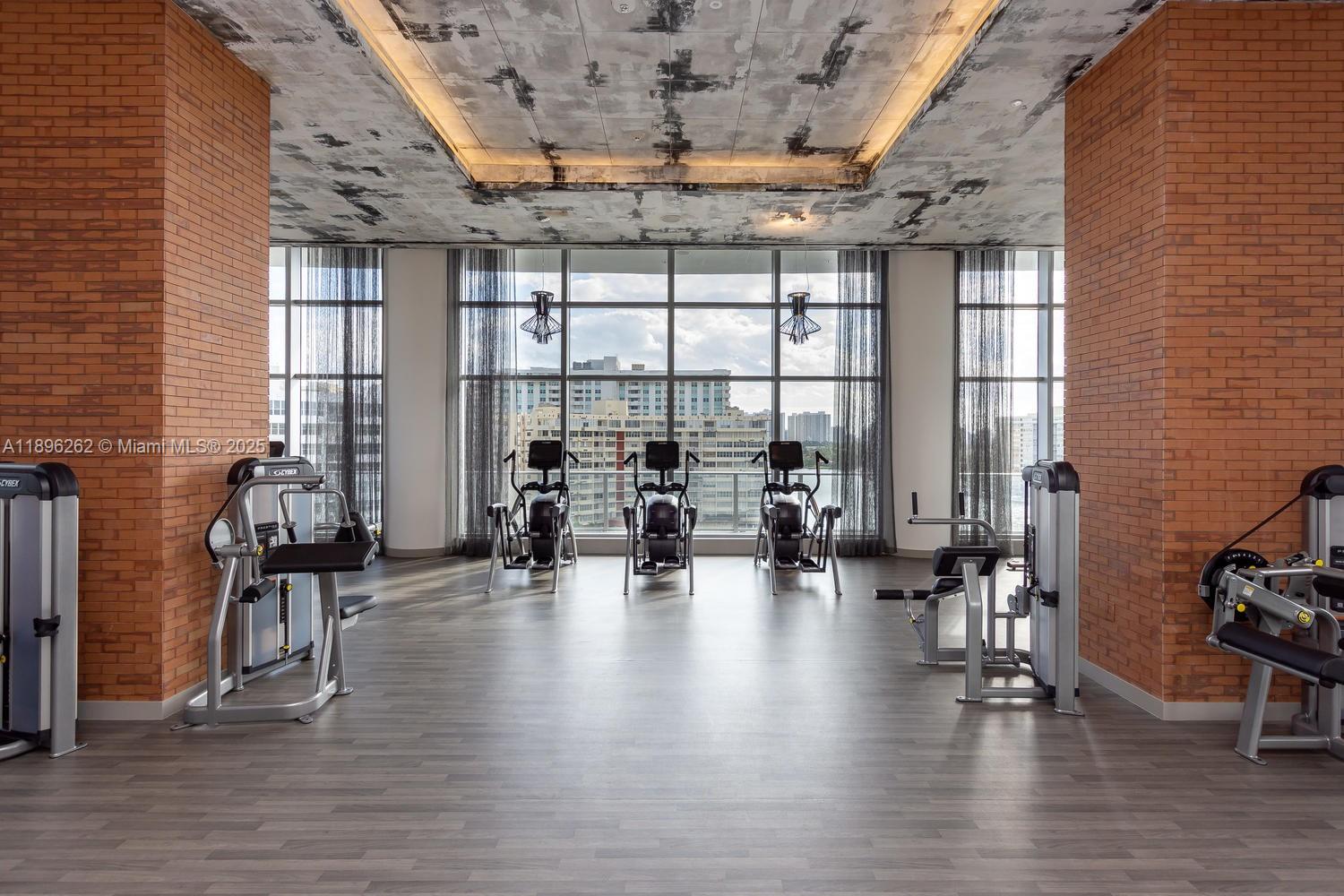 4010 South Ocean Drive, Unit R2004 Hollywood, FL 33019 - Photo 33 of 34 a lobby with furniture and floor to ceiling window