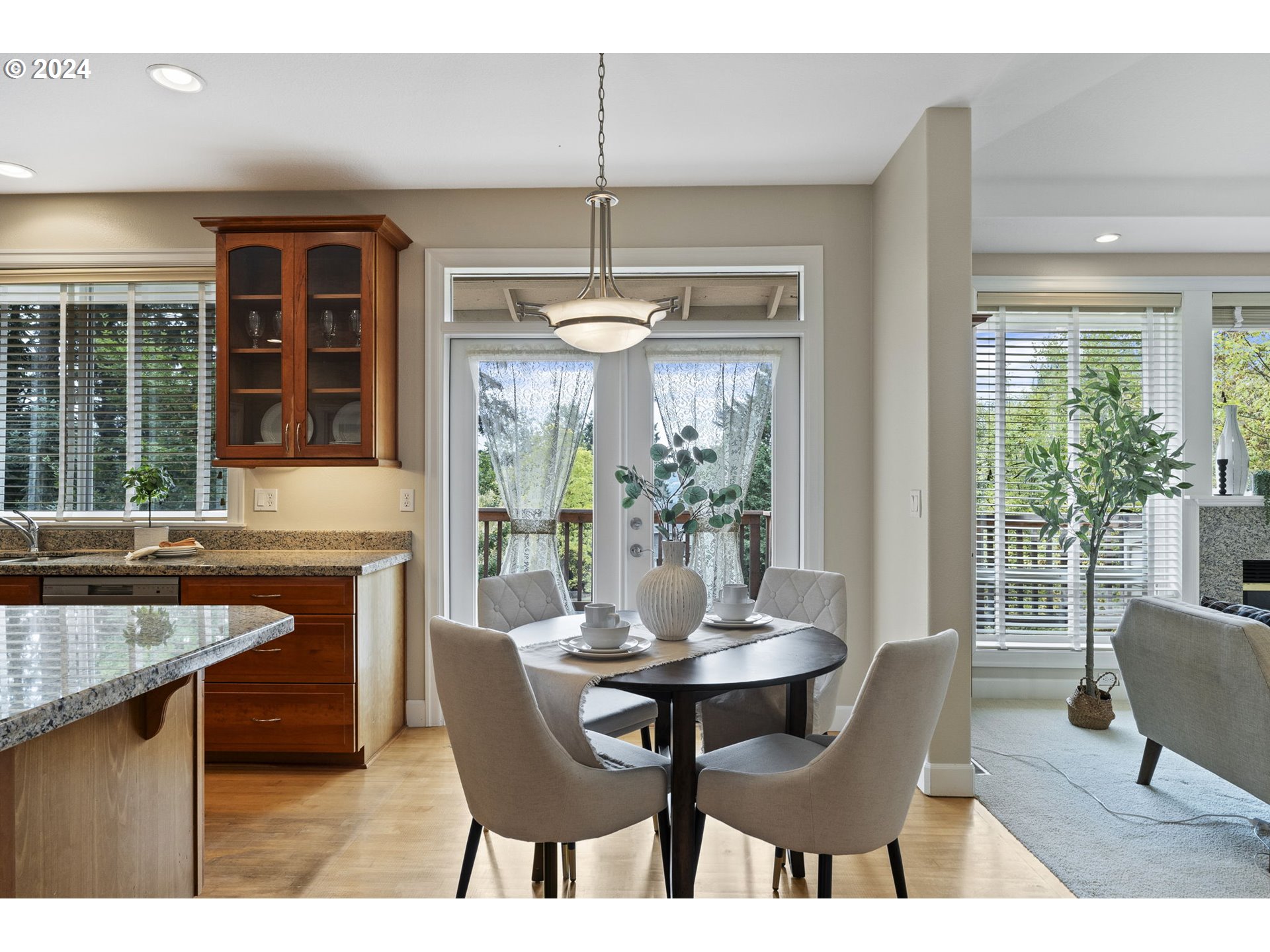 2250 Crestview Drive West Linn, OR 97068 - Photo 20 of 48 a dining room with furniture a chandelier and window