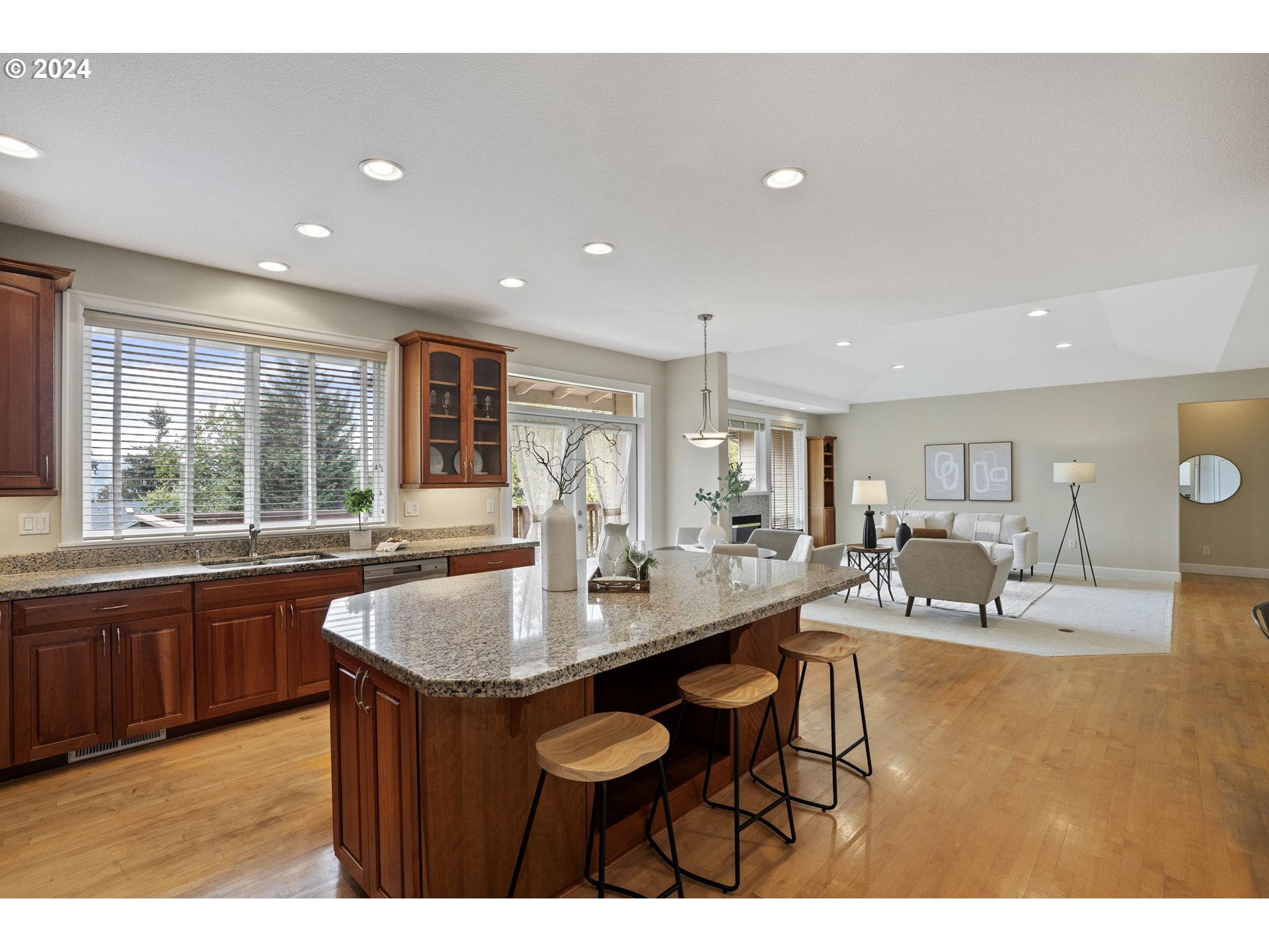 2250 Crestview Drive West Linn, OR 97068 - Photo 24 of 48 a kitchen with granite countertop a sink and chairs