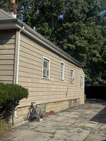 a view of a house with a patio