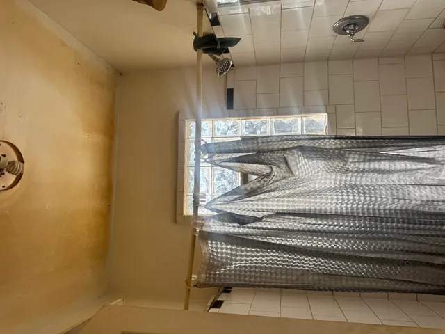 a view of kitchen with granite countertop
