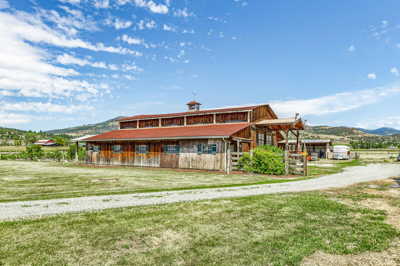 4756 Fern Valley Road Medford, OR 97504 - Photo 4 of 89 a front view of a house with a garden