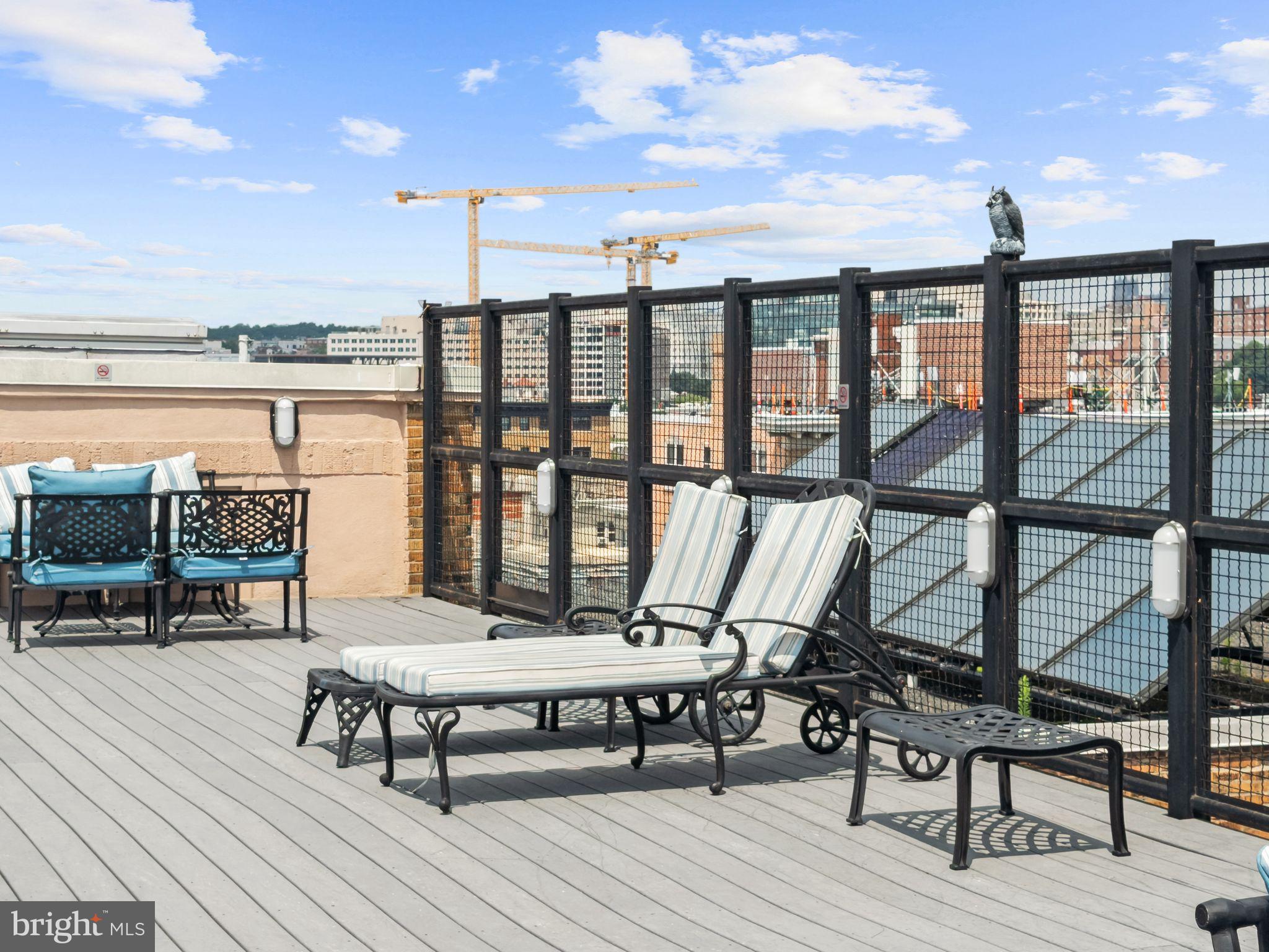 1701 16th Street Northwest, Unit 544 Washington, DC 20009 - Photo 25 of 40 Lounge chairs on the rooftop