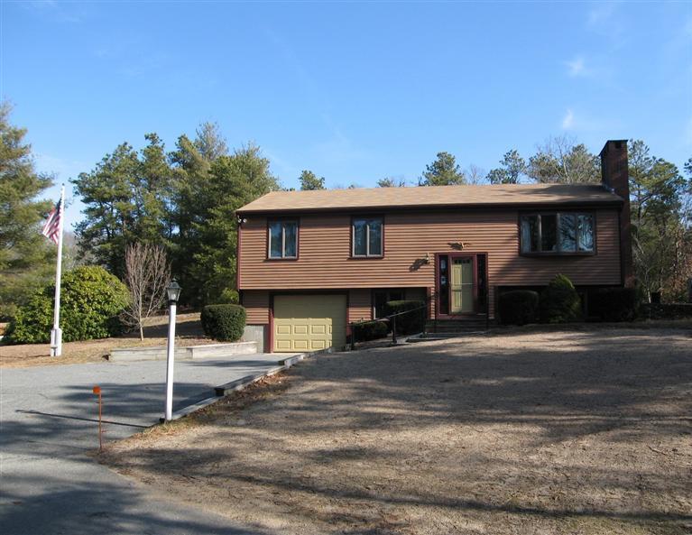 1800 South County Road Osterville, MA 02655 - Photo 13 of 17 a house with trees in the background