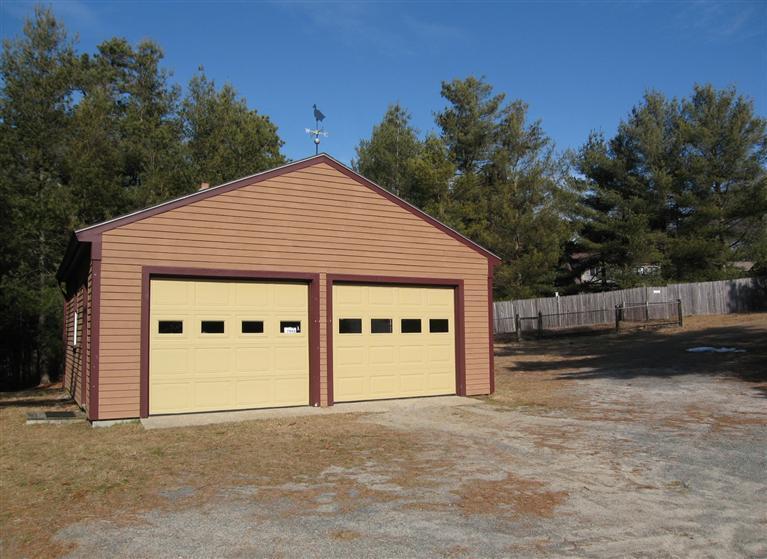 1800 South County Road Osterville, MA 02655 - Photo 3 of 17 a view of a house with a garage