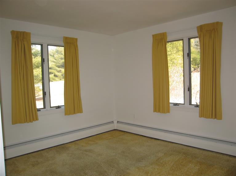 1800 South County Road Osterville, MA 02655 - Photo 10 of 17 a view of an empty room with a window