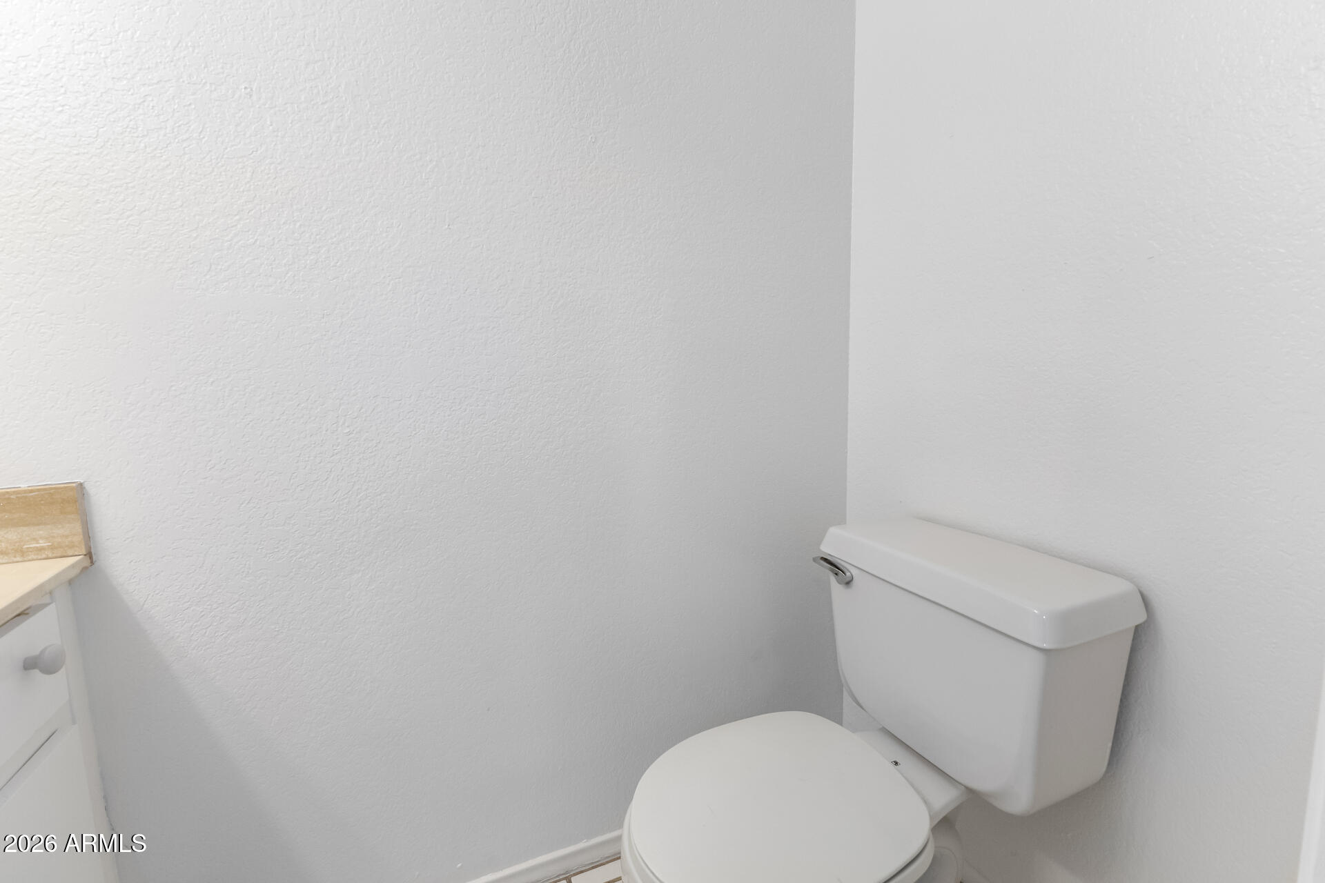 6348 North 7th Avenue, Unit 1 Phoenix, AZ 85013 - Photo 17 of 36 a white toilet sitting next to a white wall