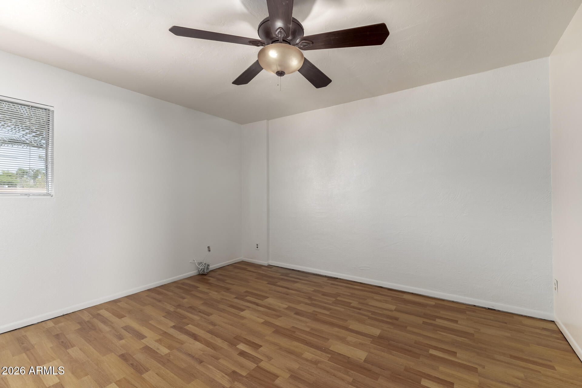 6348 North 7th Avenue, Unit 1 Phoenix, AZ 85013 - Photo 18 of 36 wooden floor in an empty room