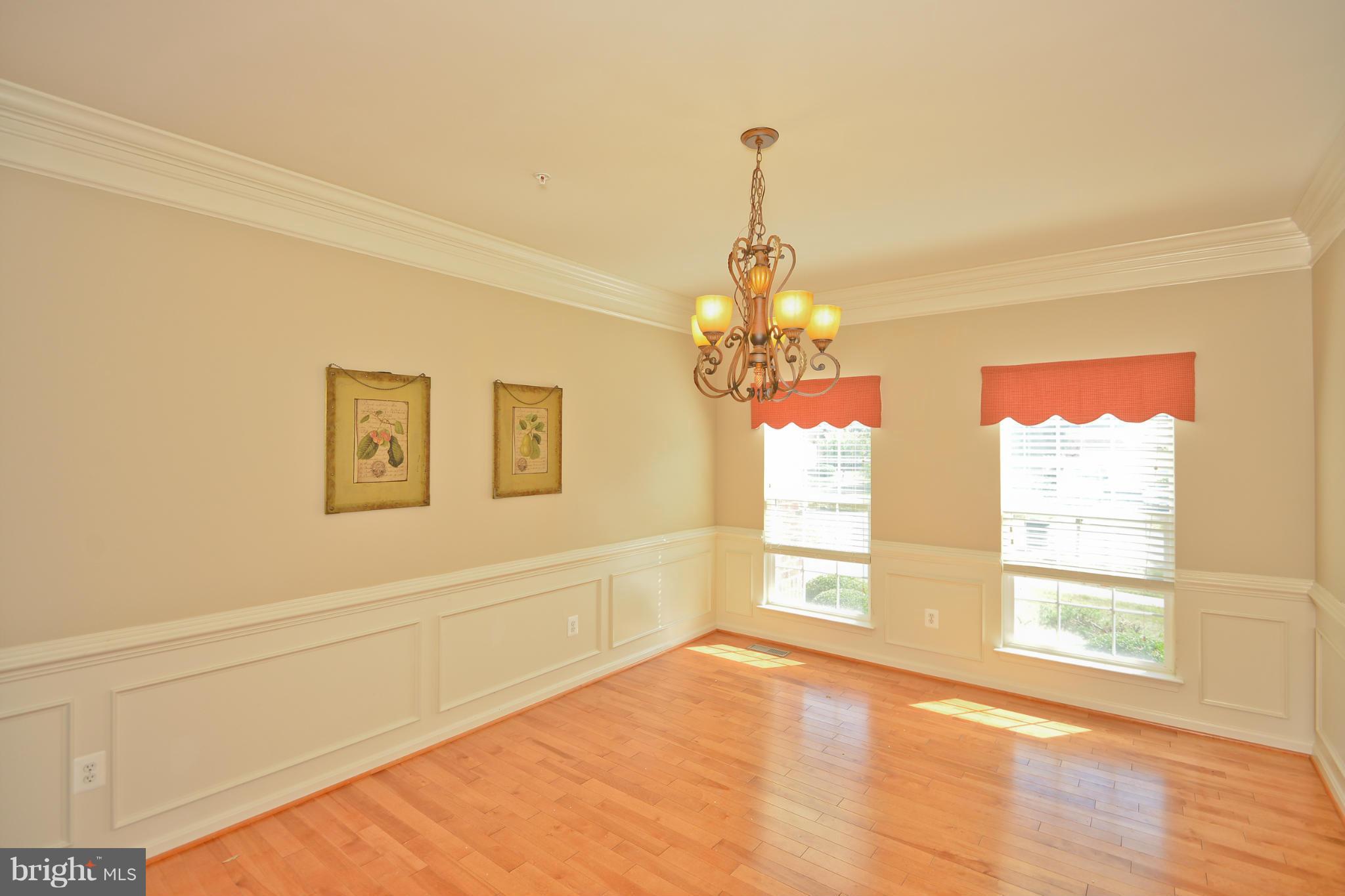 14618 Bubbling Spring Road Boyds, MD 20841 - Photo 4 of 26 a view of an empty room with a window