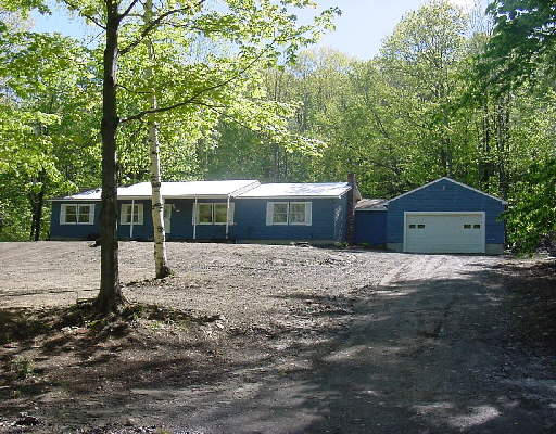 210 Lyons Hill Road Athol, MA 01331 - Photo 1 of 1 a front view of a house with a yard