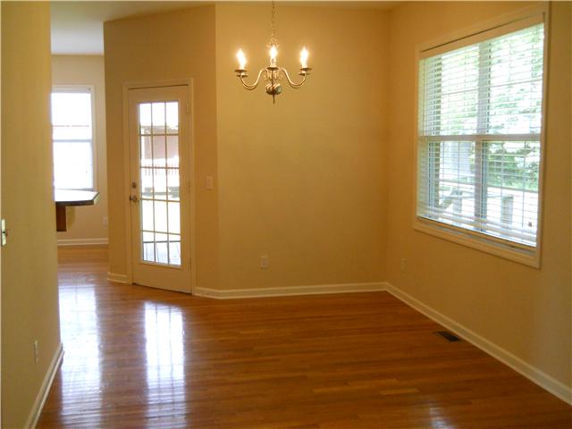 238 Hunt Creek Road Manchester, TN 37355 - Photo 11 of 19 The dining area is off the screened-in porch and living room.