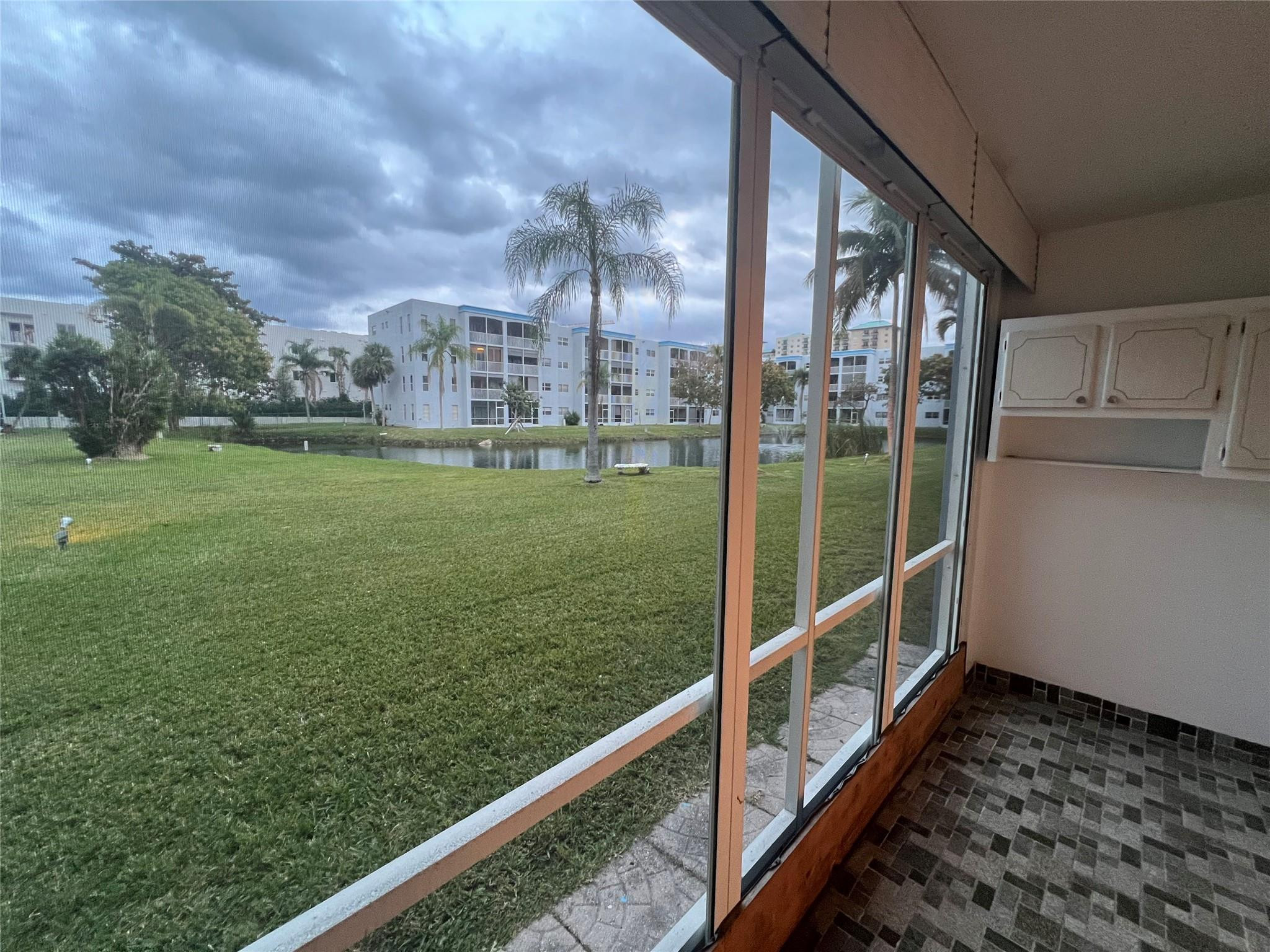 Undisclosed Address Dania Beach, FL 33004 - Photo 8 of 8 a view of balcony with yard