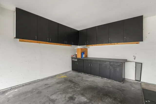 a kitchen with a cabinets and a window