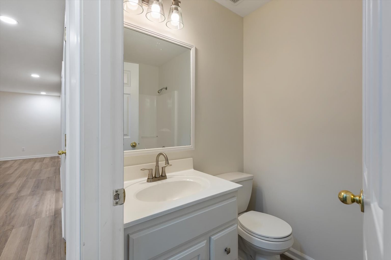 1775 Nelson Road Goodlettsville, TN 37072 - Photo 15 of 45 a bathroom with a toilet a sink and mirror