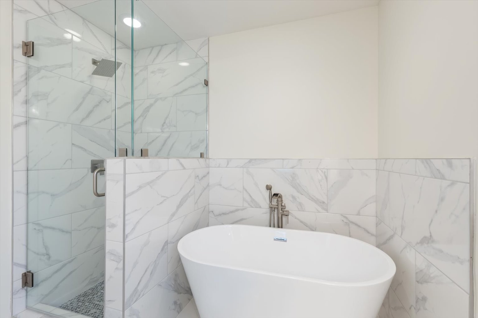 1775 Nelson Road Goodlettsville, TN 37072 - Photo 24 of 45 a white bath tub sitting in a bathroom and a shower